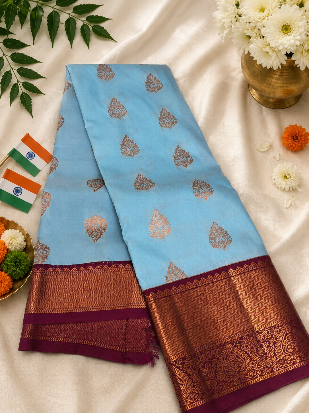 Graceful Sky Blue Kanjivaram Saree with Maroon Border & Zari