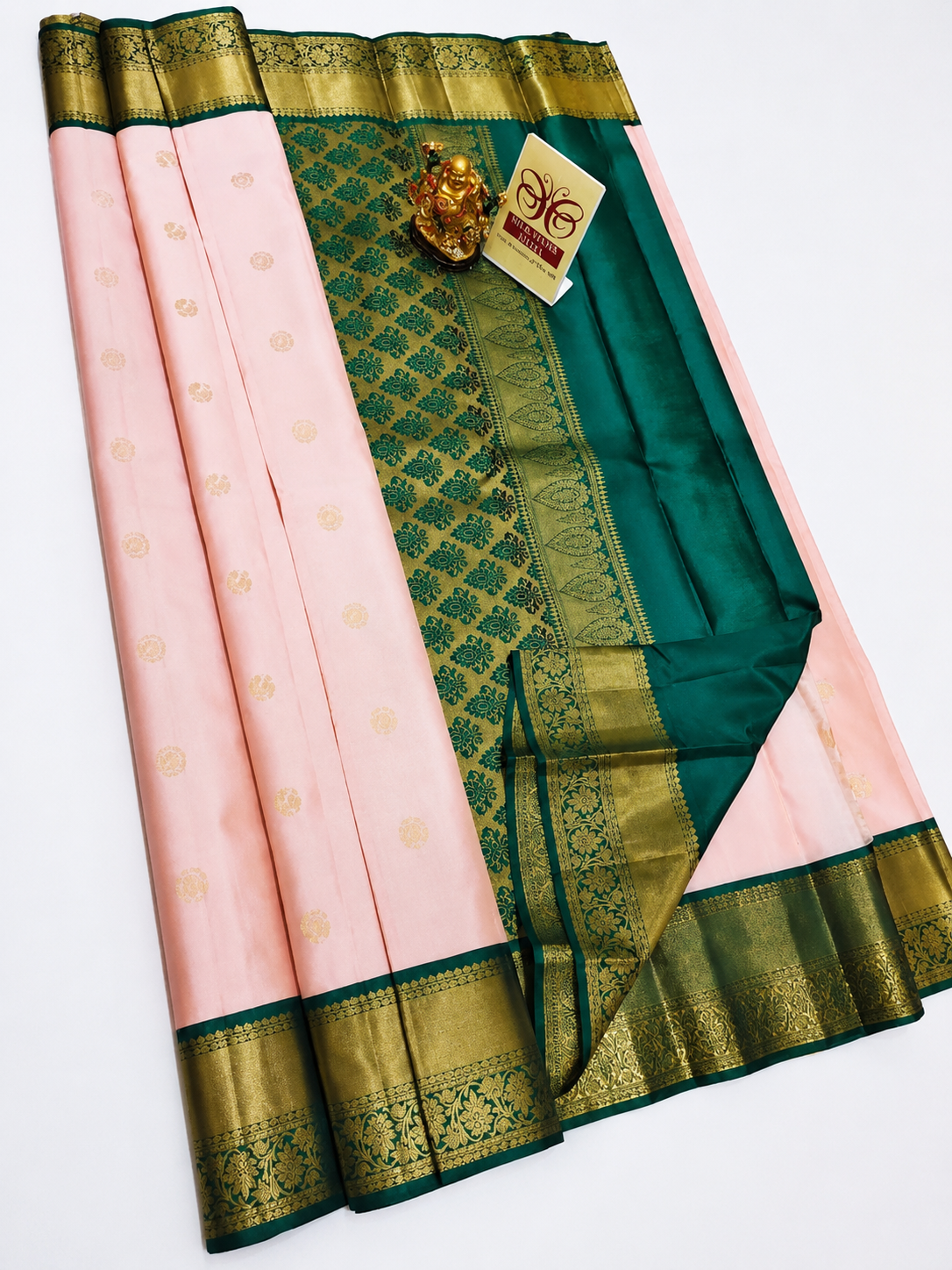 Baby Pink Kanjivaram saree with Contrast Peacock Green Border & Pallu
